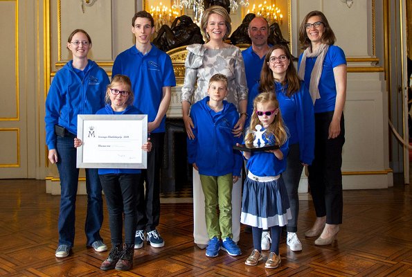 Queen Mathilde wore NATAN top from Natan Couture 2019 collection with graphics. Managed by the King Baudouin Foundation