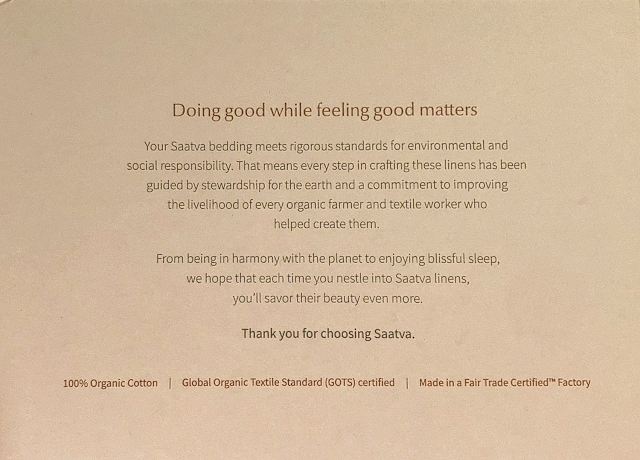 Close up of printed card inside the Saatva organic sheet set packaging