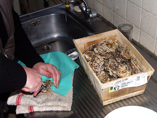 Opening oysters. Photo by Loire Valley Time Travel.