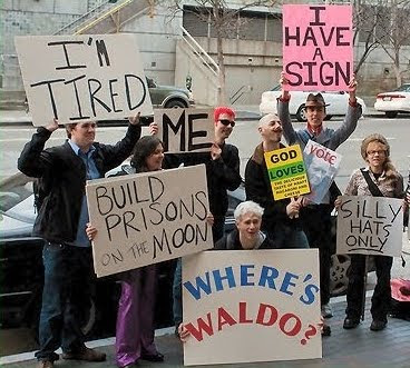 Meta Protest Sign: 'Build Prisons on the Moon'