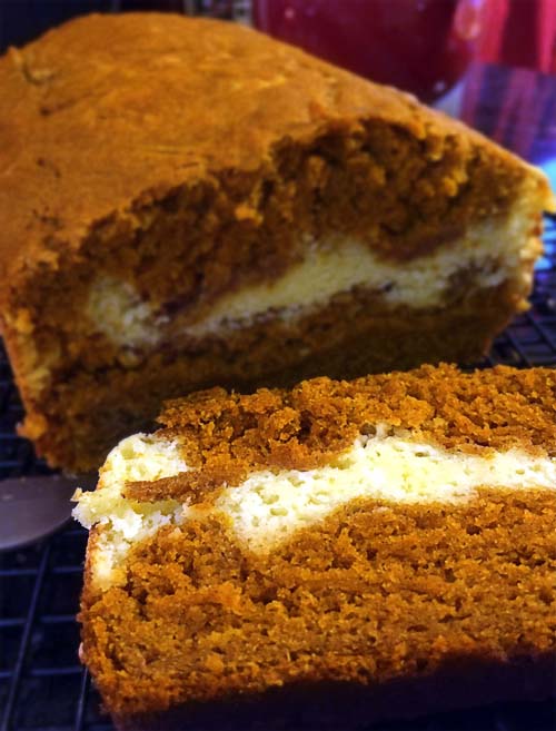 Pumpkin Cheesecake Bread. Delicious, simple to make, pumpkin bread with a layer of creamy cheesecake in the middle. It's delicious!