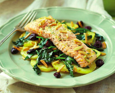 Roasted Salmon on Crispy Potatoes with Spinach and Almonds