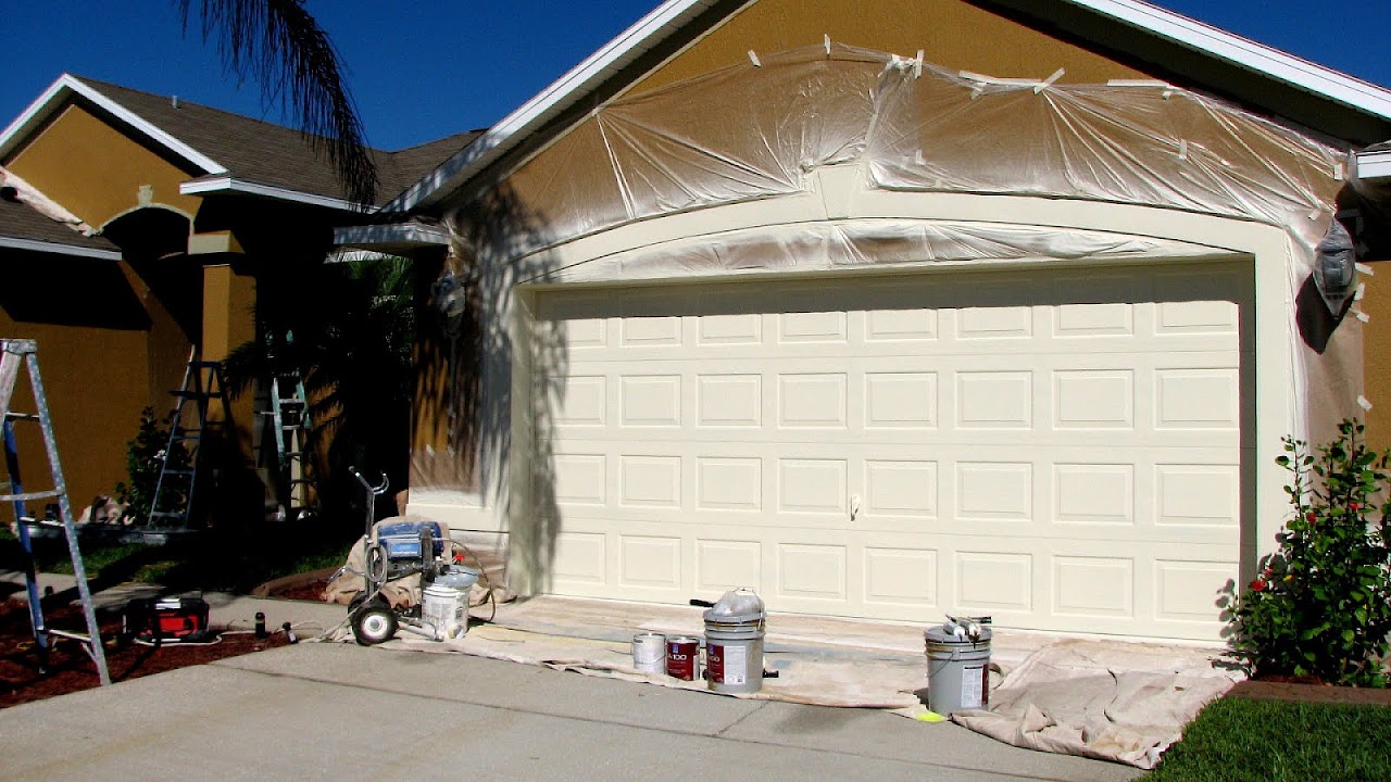 Spray Painting Exterior Of House