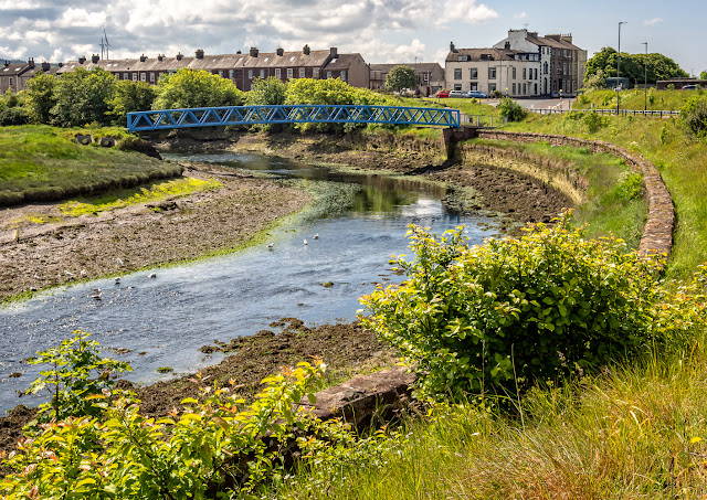 Photo of the blue bridge over the River Ellen at Maryport