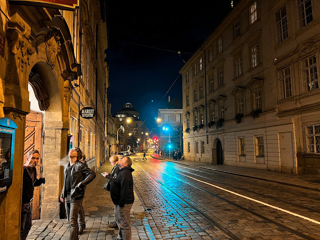 picture of people in the street at night