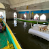 Filipino priest celebrates mass in a flooded chapel in Bulacan