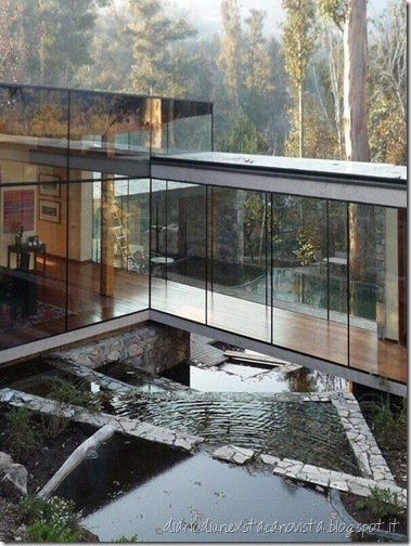 glass house in the forest