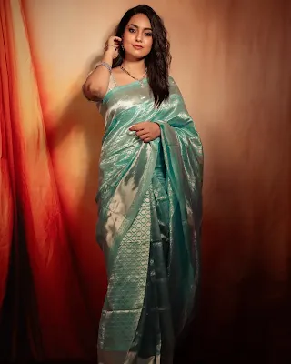 Pavithra Janani in her latest stunning photoshoot, looking elegant and stylish
