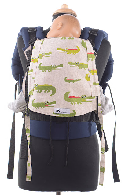 Full Buckle Babytrage von Huckepack, stufenlos mitwachsendes Rückenpanel aus Tragetuch, Träger können am Panel oder am Hüftgurt befestigt werden, Komforttrage mit Schnallen.