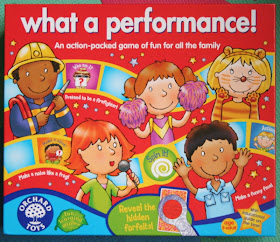 What A performance game by Orchard Toys Box front