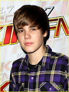 Justin Bieber Pictures Justin Bieber Pictures (justin bieber hits ceiling glass with grammy)