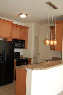 The kitchen in Venus 305.  Notice the light fixture above the breakfast bar