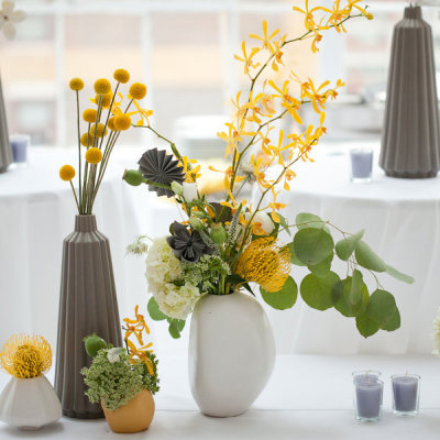 Modern yellow and gray wedding centerpieces Whether your wedding style is 