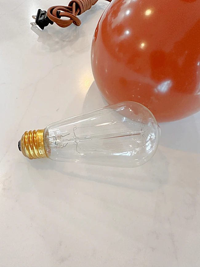 round lamp and Edison bulb