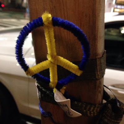 peace sign at the site of the Boston Marathon Bombing on Boylston St