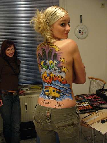 cat tattoo on her back girl nude tattooed girls. cat tattoo on her back girl