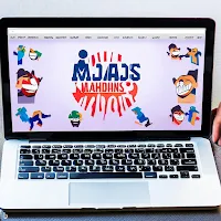 A laptop displaying the Madjacks Sports Forum website with a user typing a sports-related joke, surrounded by laughing emojis