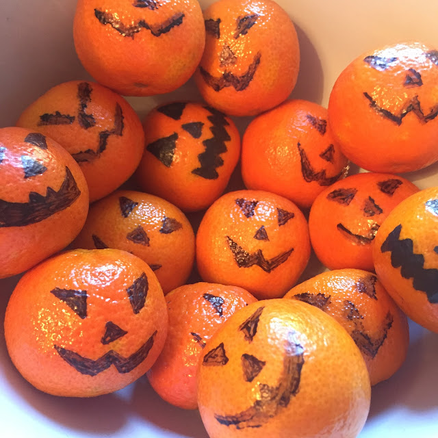 pumpkin satsumas using a Sharpie