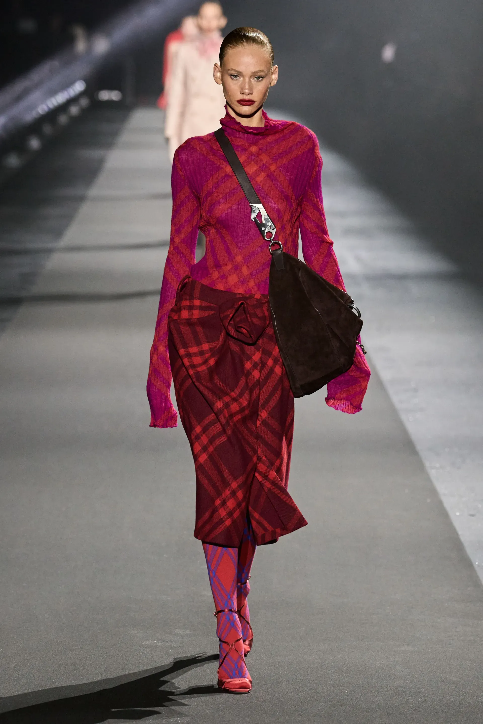 Tess Carter wearing Burberry and Jimmy Choo.