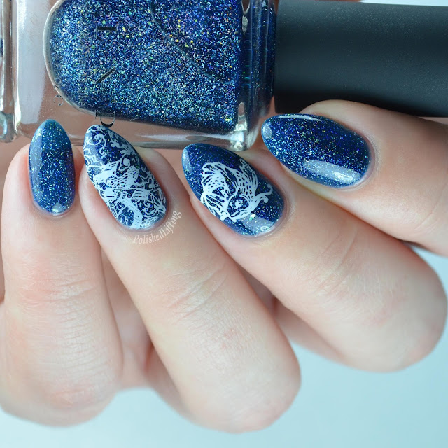 blue jelly holographic nail polish with fish stamping