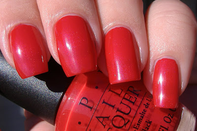 opi oui bit of red swatch