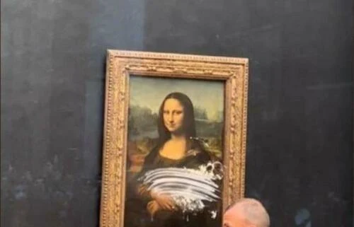 Watch: Climate Activist Smashes Cake Into Mona Lisa At Louvre