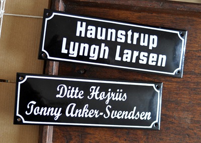 White on black enamel signs