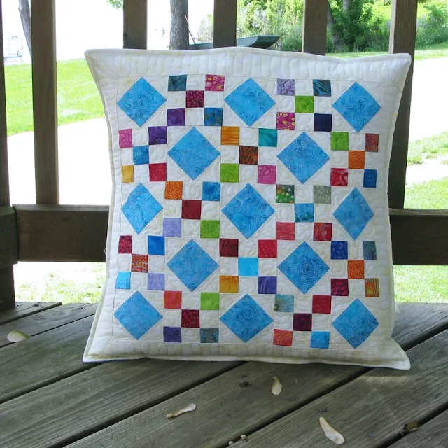 scrappy quilted pillow