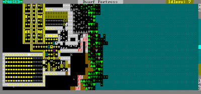 Dwarf Fortress in its pure ASCII Form. Taken from Bay12 description: "Here the dwarves have carved out a little fotress to live in. The river at this embark location gave us a steep grade to work with. Living quarters are at the top left, furnished with objects created in the workshops at the bottom of the image. The food stockpile is at the top center ( food barrels and seed bags filled with the provisions we brought along). Stone is stockpiled at the bottom left. Orthoclase!"
