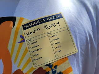 Manresa Bread to-go sticker with hand-drawn message [sic.] "Kevin Turky"