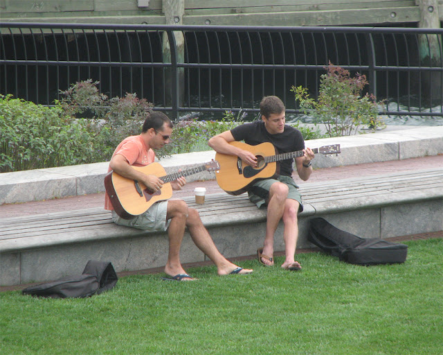 Playing guitar, Battery Park City Esplanade, New York