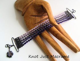 Shades of purple cuff style bracelet with handcrafted wire pieces