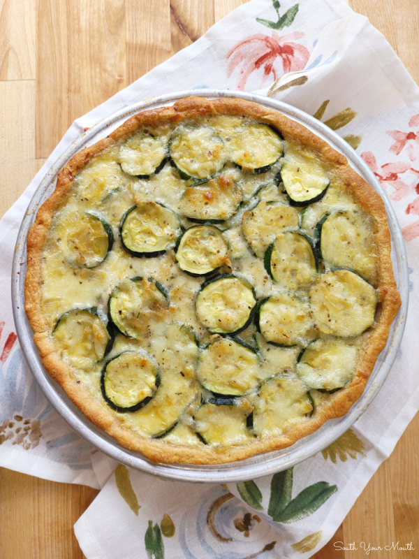 Zucchini Pie! A savory pie or tart recipe made with zucchini, mozzarella cheese and Italian herbs baked in a crescent roll crust.