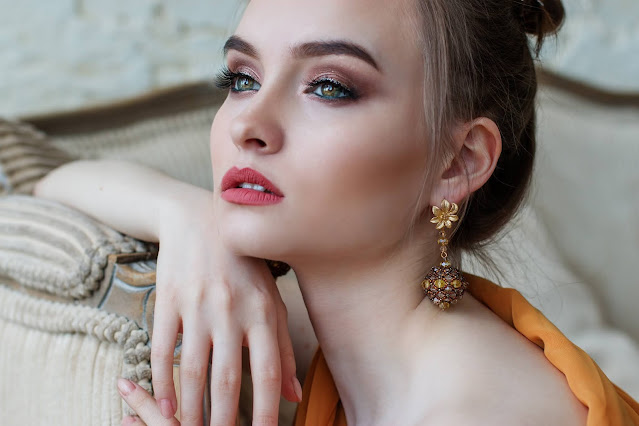 Pretty woman modeling jewelry.