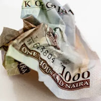 What is a Liquidity squeeze and how does it affect Nigerian Treasury bills?