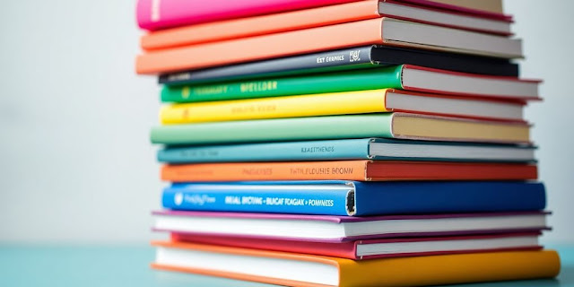 Stack of colourful books representing a publishing boom.