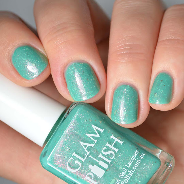 green nail polish with shimmer swatch