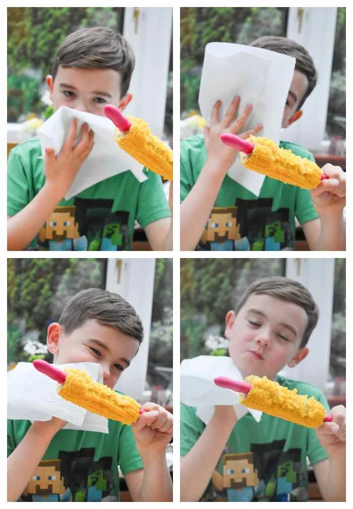 Moping up butter from corn on the cob