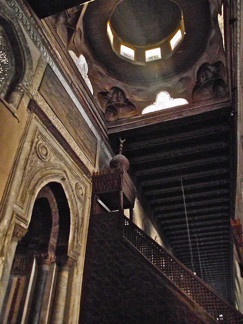 The minbar is located next to the mihrab which means it is also on the qibla wall. It is where the imam delivers his sermons.