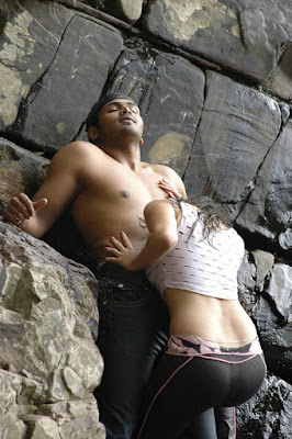 Indian actress Sneha Ullals wet pants get sticked to her body and expose hot thighs and sexy back