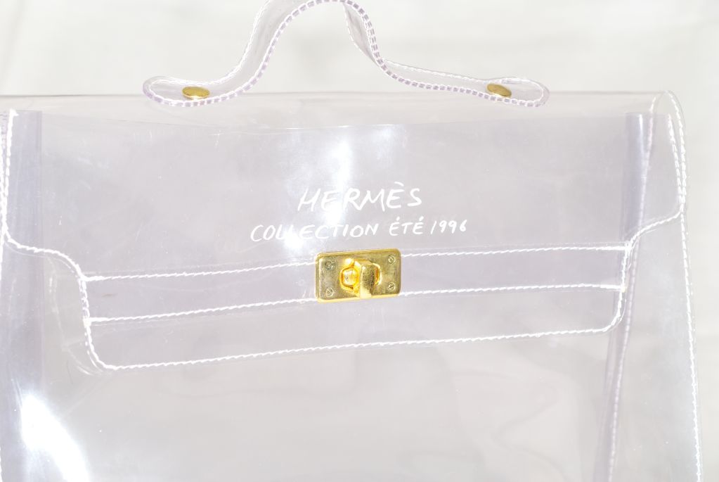 1996 Hermes Clear Kelly bag with gilt metal turn lock hardware.