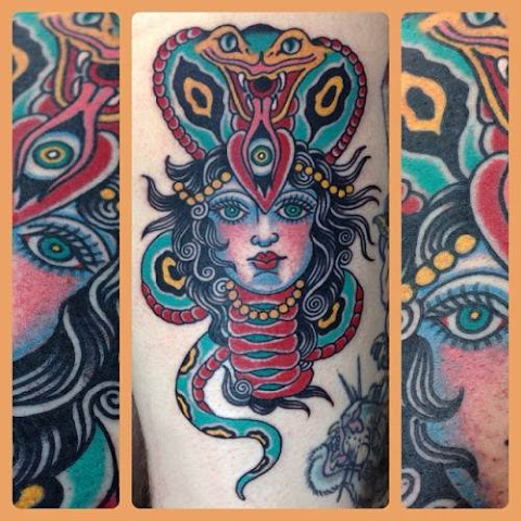 10 Beautifully Twisted Snake Lady Tattoos