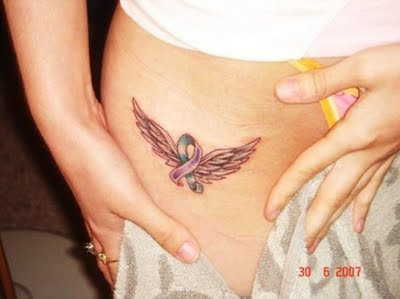 Wings Tattoo on Lower Abdomen - Tattoos For Girls