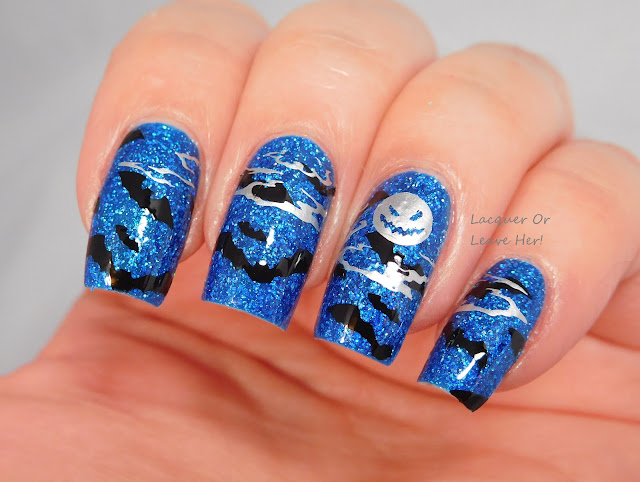 Winstonia Horror Night plate over Blue-Eyed Girl Lacquer Deep Blue Dream stamped with Messy Mansion polishes