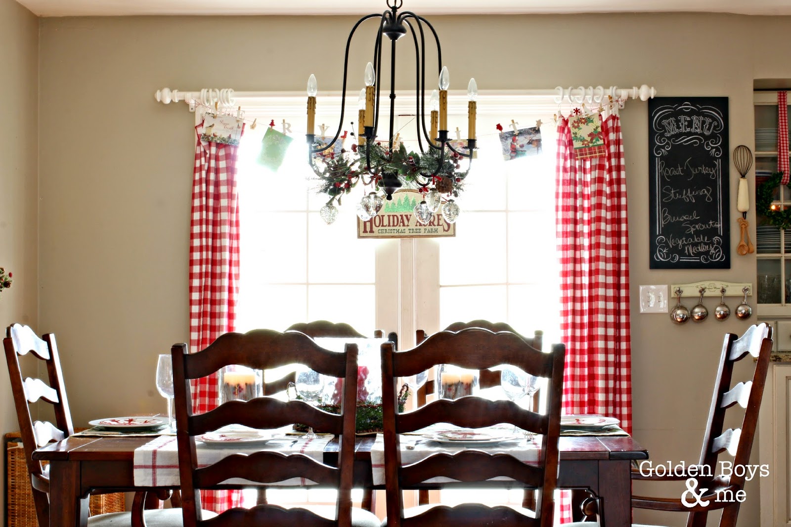 Red and white gingham tablecloths as curtains in Christmas kitchen-www.goldenboysandme.com