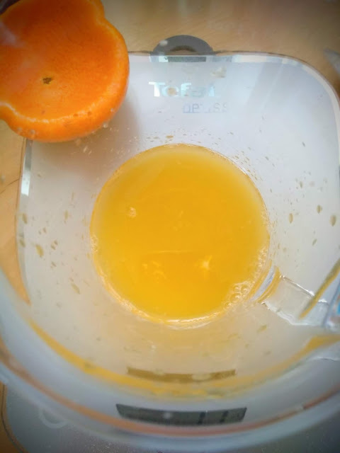 Squeeze one orange and pour the juice into a glass