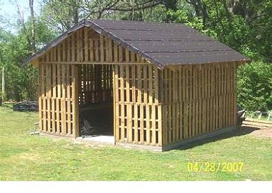 aren't any actual plans for this pallet shed but nice step-by-step 