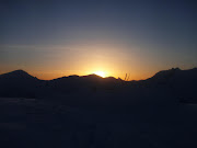 Sunset (sunset with skis silloueted)