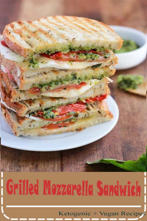 This Grilled Mozzarella Sandwich is made with fresh tomatoes and walnut pesto grilled with sourdough bread. It's easy to assemble and bursting with flavor!