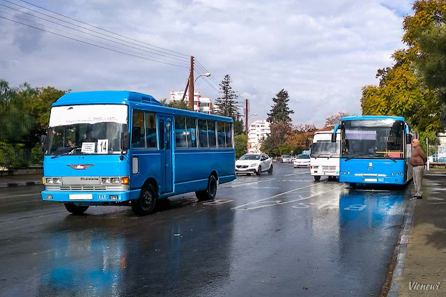 Buses waiting for the next course - Limassol, Old HBuses parked on the road, waiting for the next runospital